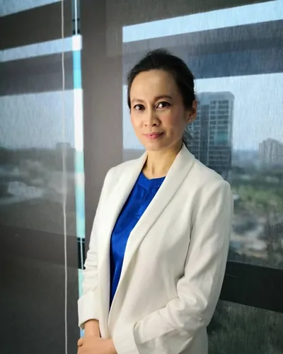 Dr Kartini Farah Rahim, white blazer, portrait