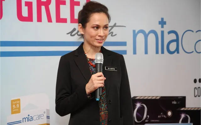 Dr Kartini speaking at a health education event